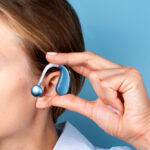 side-view-woman-wearing-hearing-aids.jpg